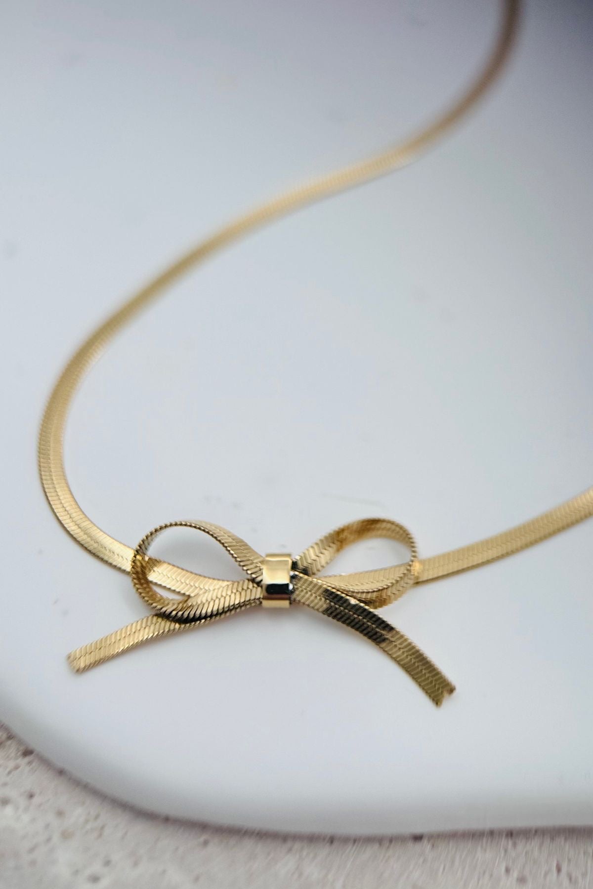 Bow snake chain